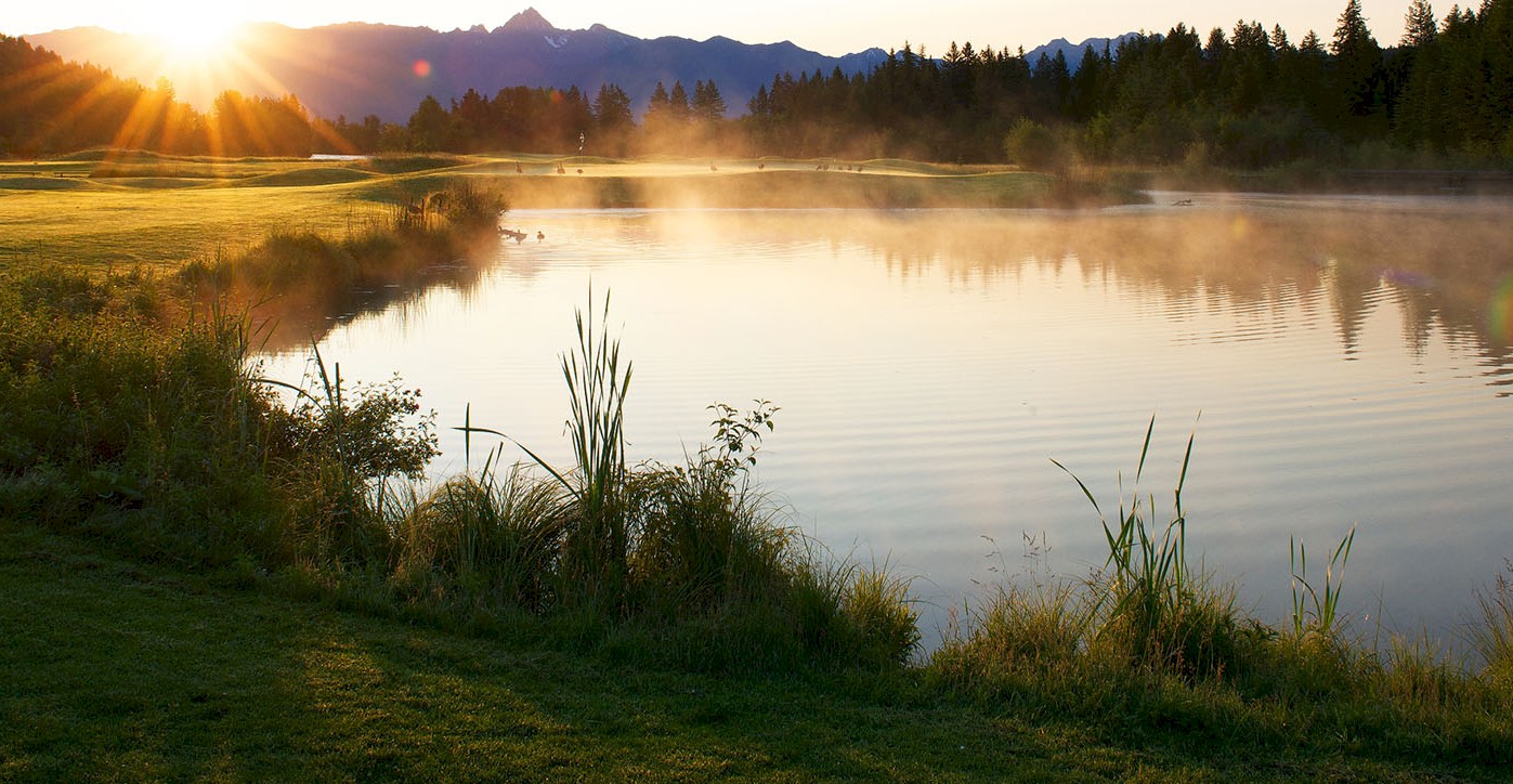 Sun burst on one of many golf course ponds